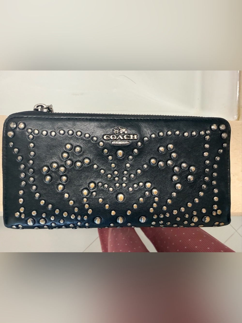 Coach Black Leather Zip-Around Wallet with Silver Stud Accents